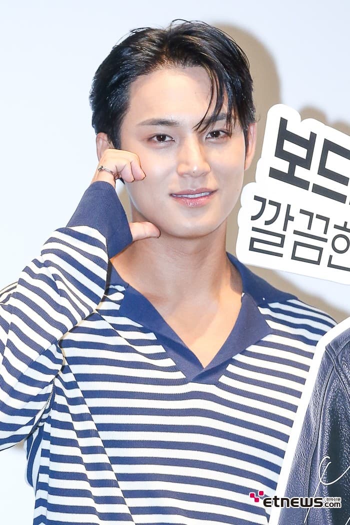 SEVENTEEN's Mingyu Showcases Masculine Appeal with Stylish Haircut